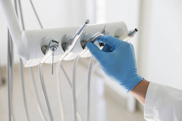 Professional Invisalign Clear Aligners technician working in Bessemer, MI
